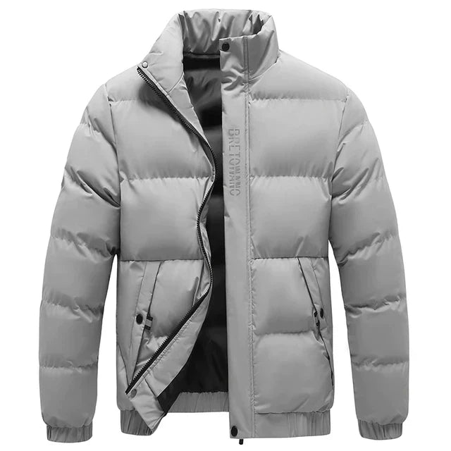 Protective men's tactical winter jacket. Windproof, waterproof, warm outerwear for harsh cold weather.