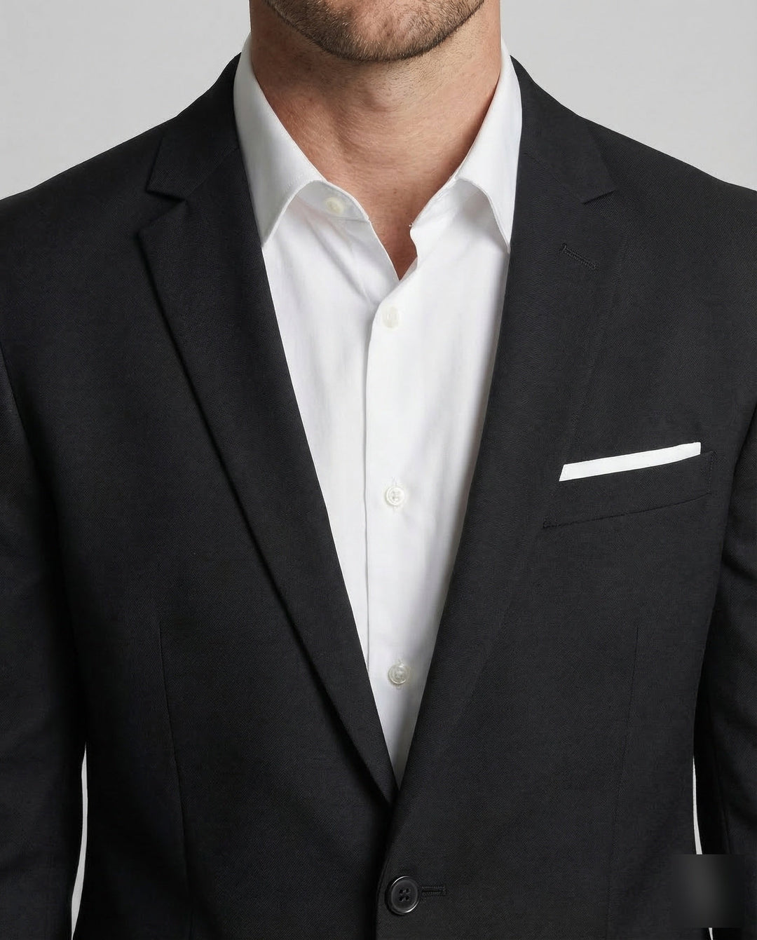 Elegant men's tailored blazer, slim fit, featuring a unique lapel, great for modern formal wear.