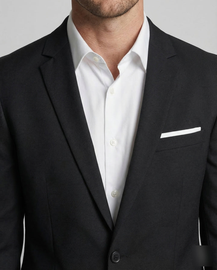Elegant men's tailored blazer, slim fit, featuring a unique lapel, great for modern formal wear.