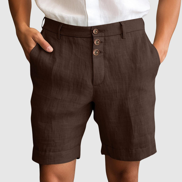 Comfortable and stylish men's linen blend shorts, featuring a classic button fly closure.