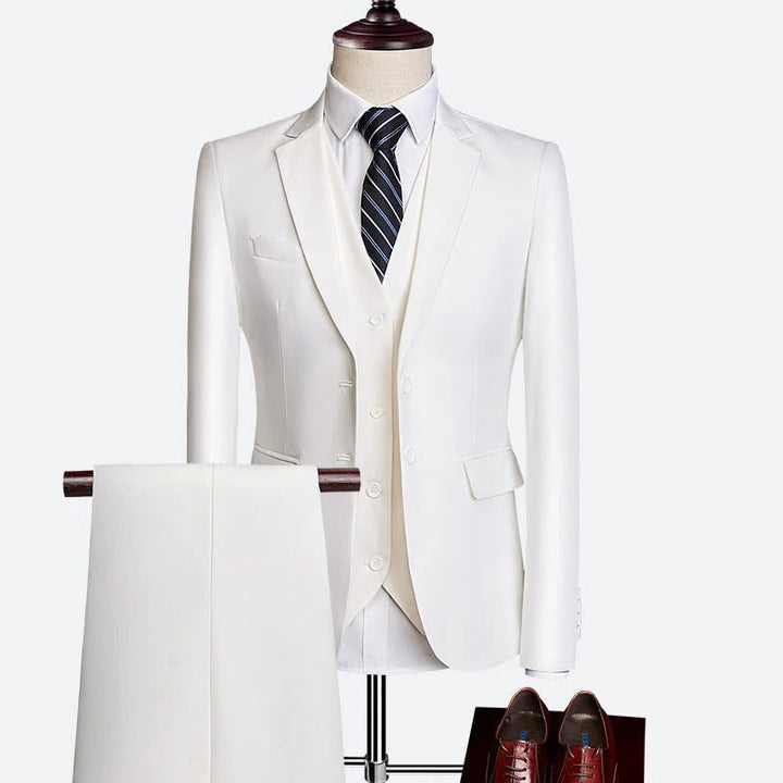 Men's formal 3-piece suit, highlighting the tailored fit waistcoat for a sharp spring look.