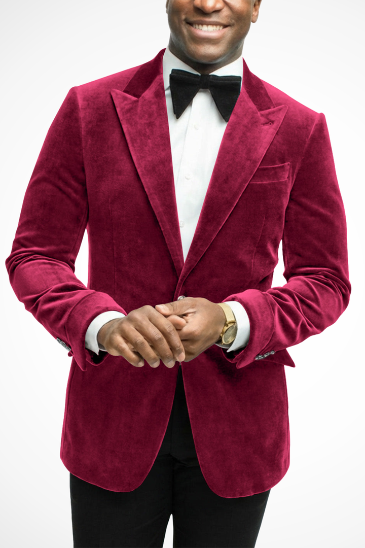 Emerald green men's tailored peak lapel blazer, elegant for any special occasion.