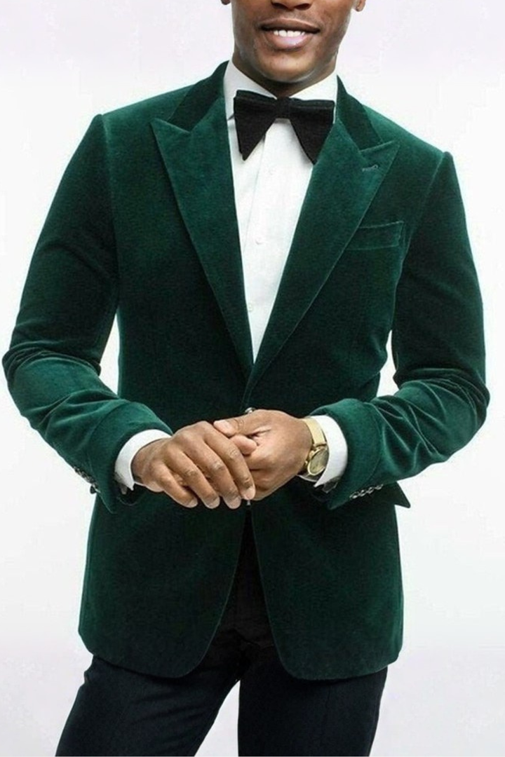 Elegant emerald green peak lapel blazer, perfect formal wear for men.