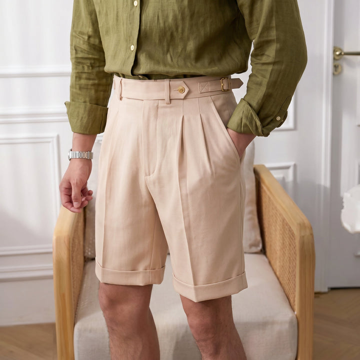 Sophisticated men's pleated Gurkha shorts, ideal for warm weather elegant smart casual outfits.