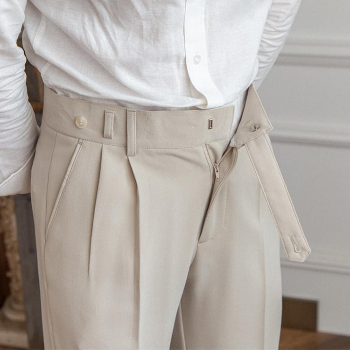 Beige men's tailored trousers, a comfortable and classic choice for versatile men's fashion.