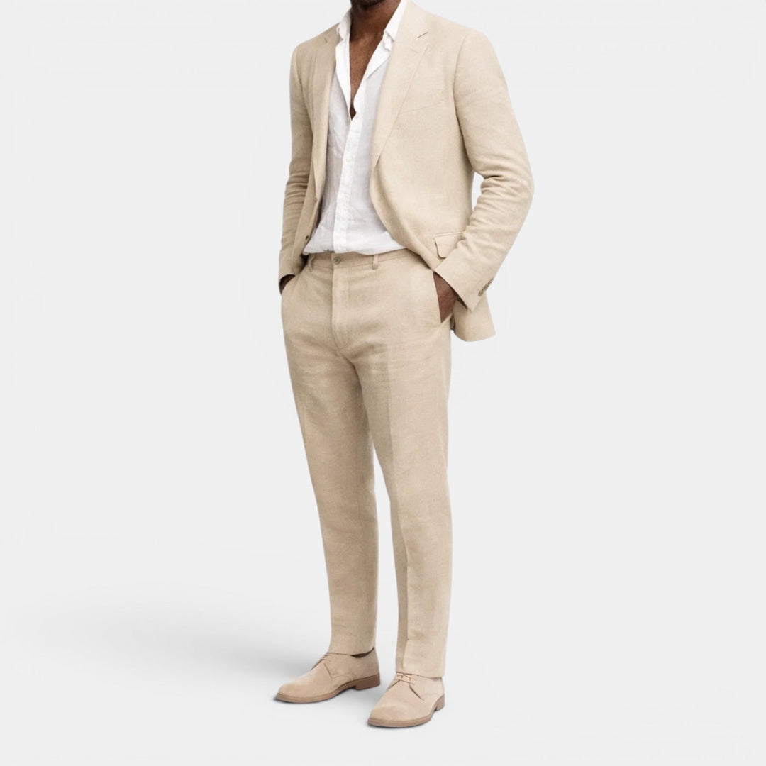 Stylish men's green tailored suit set, including a sharp blazer and matching pants. Perfect for business attire.