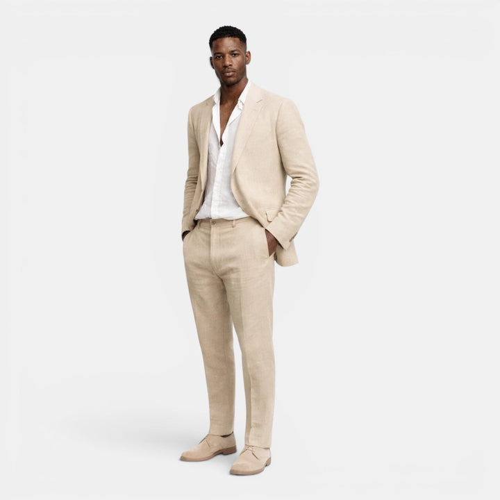 Elegant men's beige tailored suit set, featuring a stylish blazer and coordinating pants for smart casual fashion.