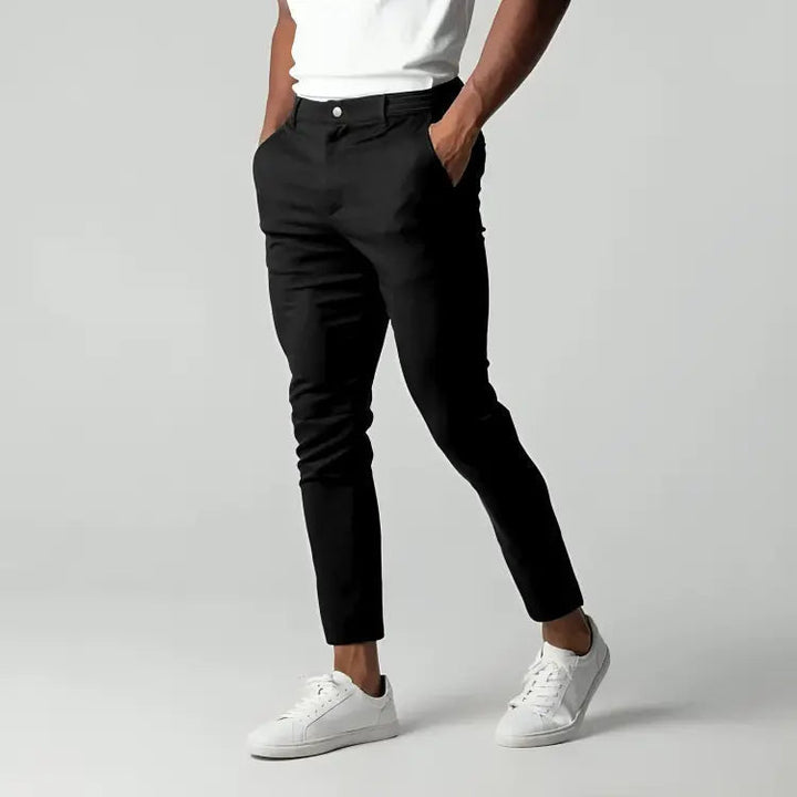 Men's tapered ankle length chinos, single button, side pockets. Smart casual modern men's pants.