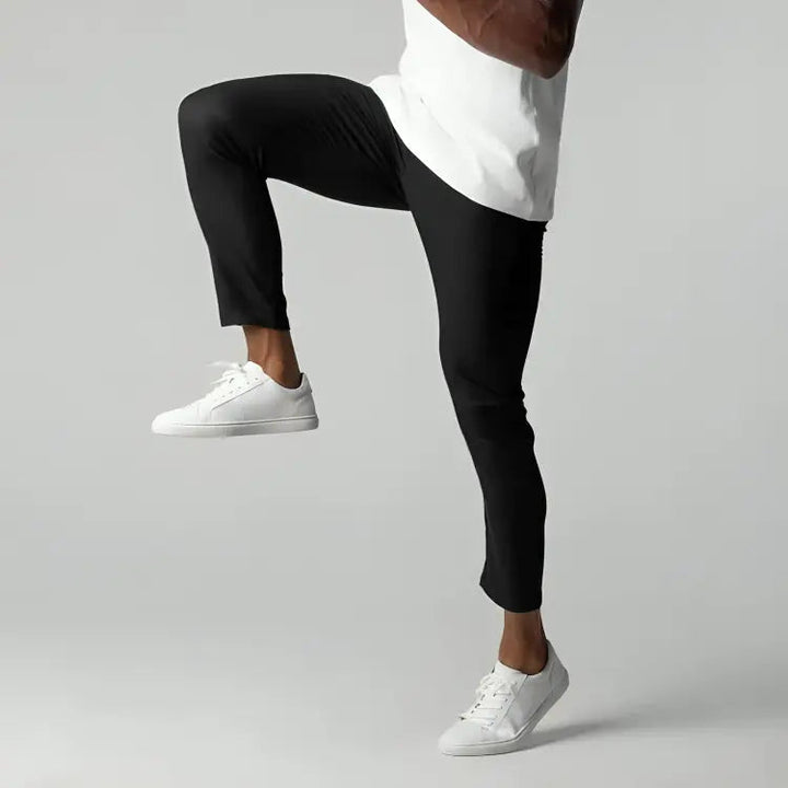 Comfortable men's fashion: tapered ankle length chinos with single button closure & side pockets.