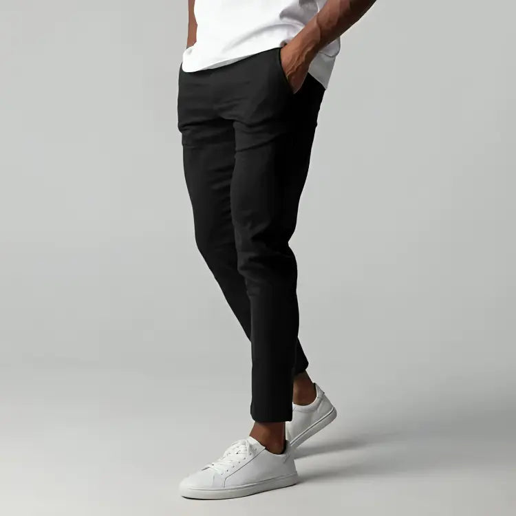 Modern men's tapered chinos, ankle length design. Features a single button and convenient side pockets.