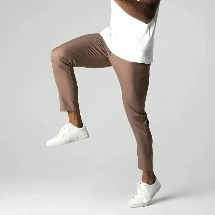 Sleek men's tapered ankle length chinos, perfect for smart casual. Includes single button & side pockets.