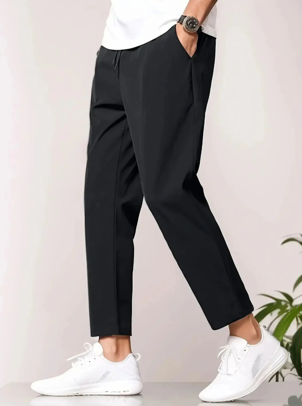 Men's tapered lightweight casual trousers with an elastic waist, perfect for everyday comfort and modern travel.