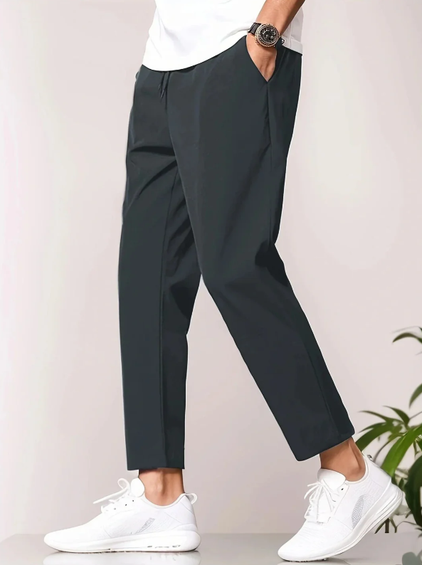Comfort fit men's tapered casual pants, modern lightweight design ideal for everyday wear & travel fashion.