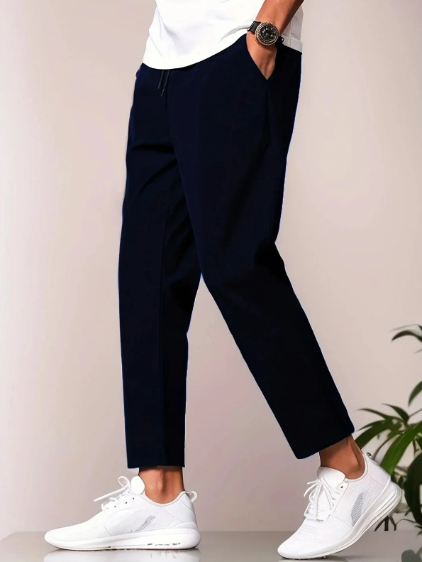 Lightweight men's tapered trousers with elastic waist for ultimate comfort. Stylish casual pants for everyday.