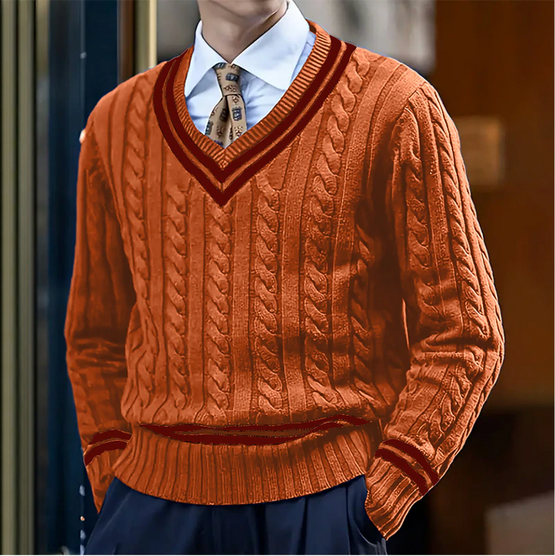 Close-up of men's V-neck sweater featuring intricate cable knit detailing and a comfortable fit.