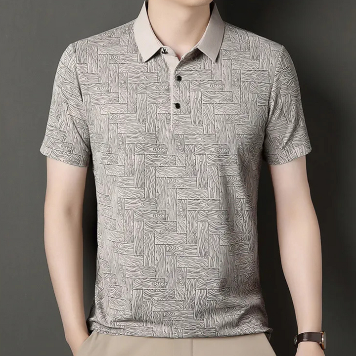 Stylish men's short sleeve polo shirt featuring a unique textured knit pattern. Perfect for smart casual wear.