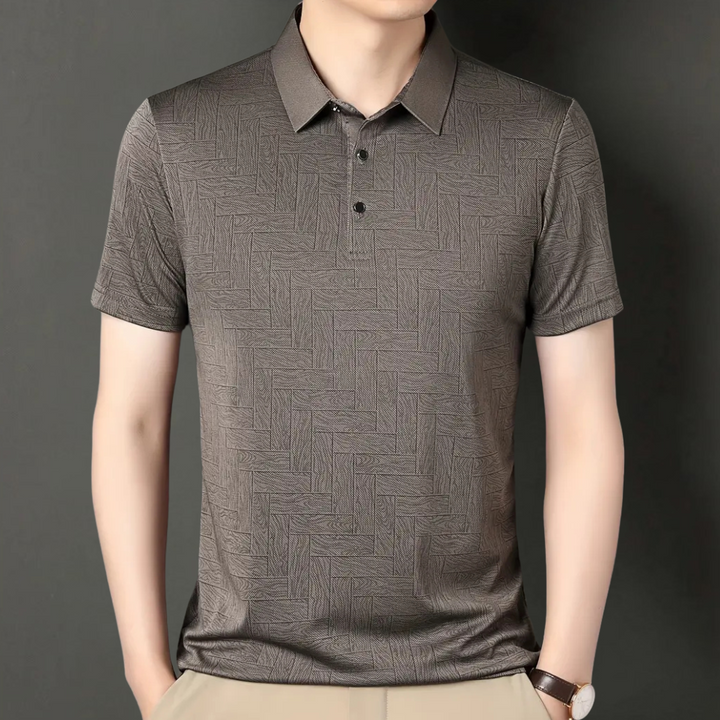 Classic men's short sleeve polo with modern textured knit. Tailored fit for a sleek, smart casual look.