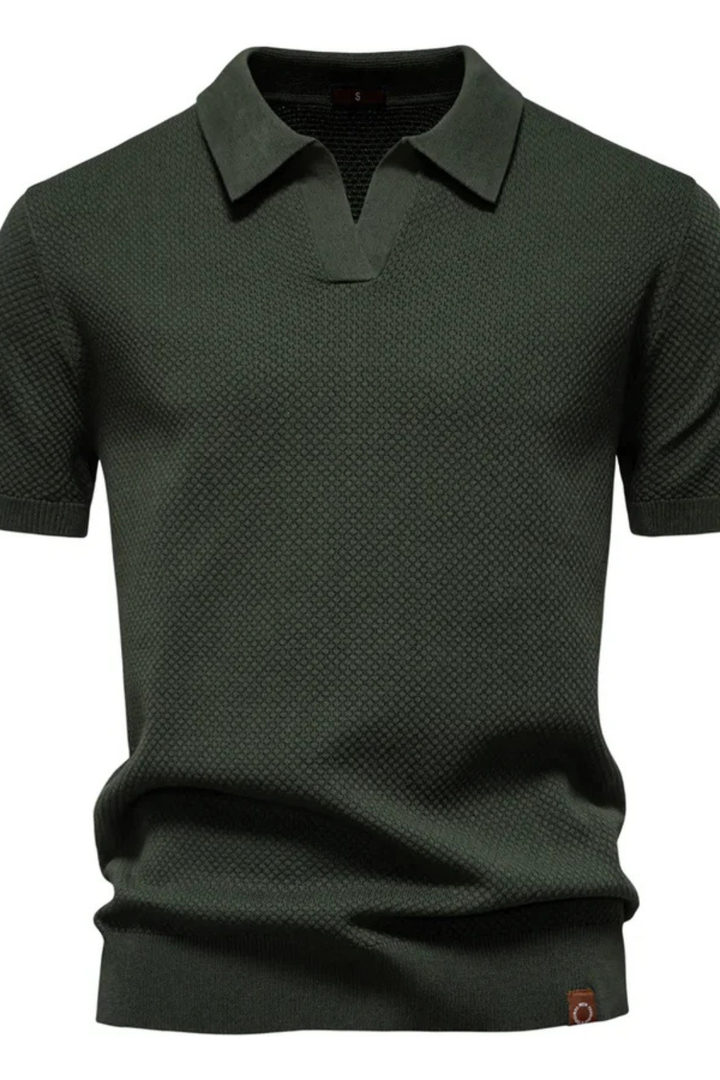 Close-up of the textured knit fabric on men's short sleeve polo