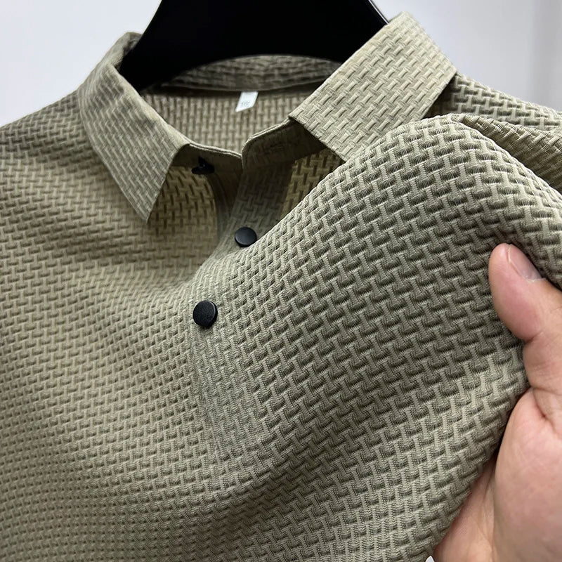 Stylish men's knit polo shirt featuring a comfortable short sleeve design and snap closure