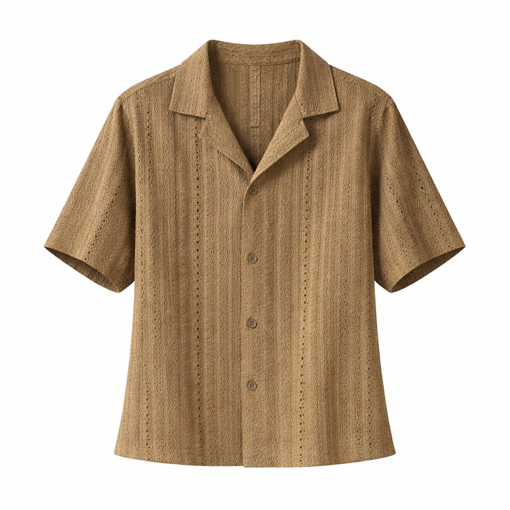 Breathable men's textured button-up shirt with an open collar. Modern, relaxed fit for summer fashion & comfort.