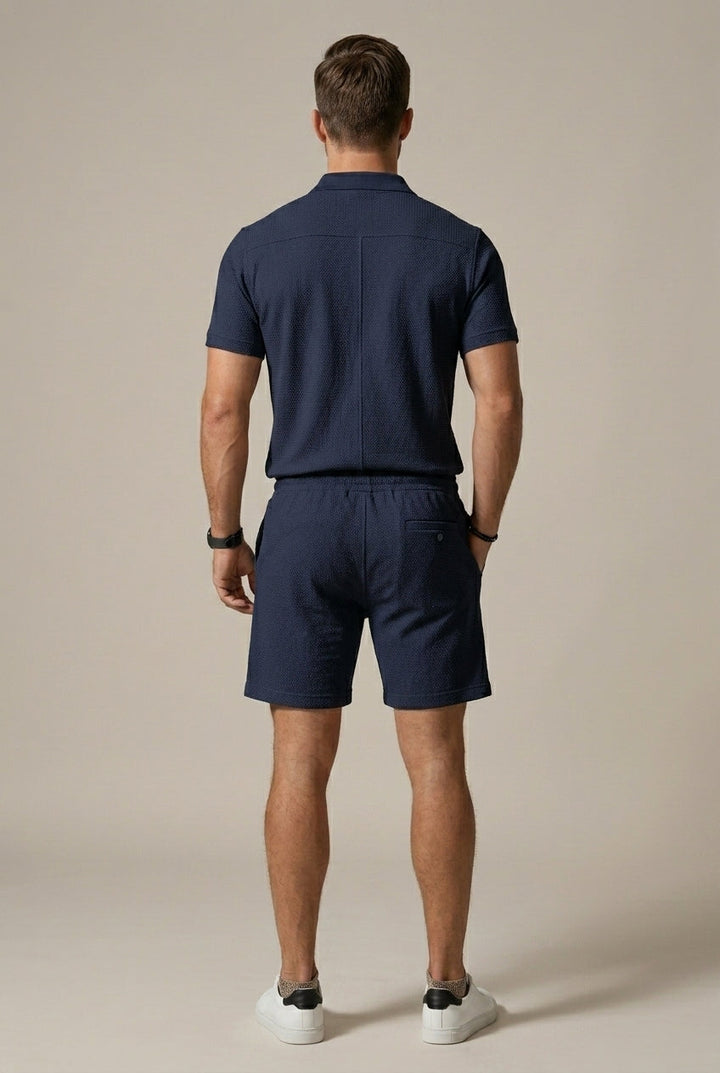 Stylish men's textured polo shirt & drawstring shorts set, perfect for spring/summer casual wear.