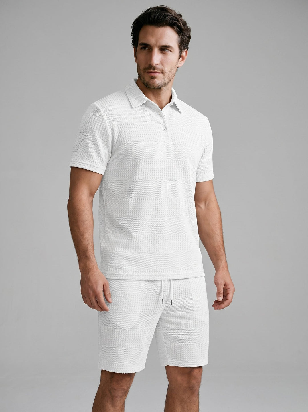 Men's textured polo shirt & shorts set. Relaxed fit, perfect for casual summer wear & loungewear.