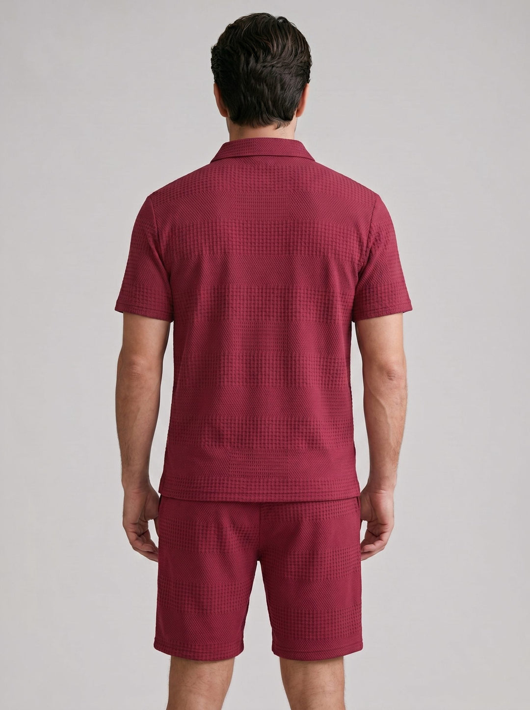 Full view of men wearing textured polo shirt & shorts set. Casual, comfortable, summer.