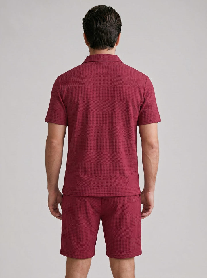 Full view of men wearing textured polo shirt & shorts set. Casual, comfortable, summer.