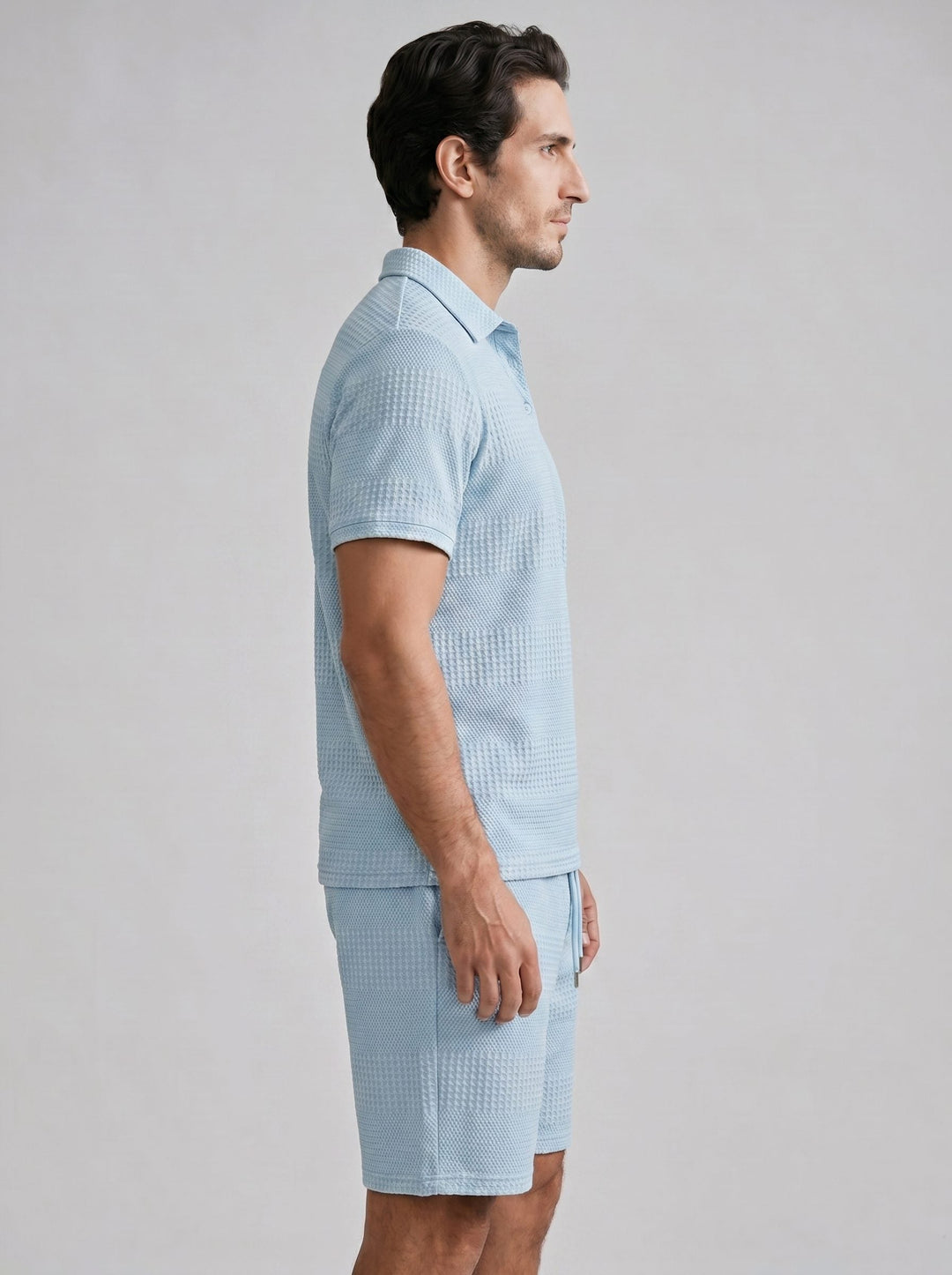 Summer-ready men's textured polo and shorts loungewear set. Relaxed fit.