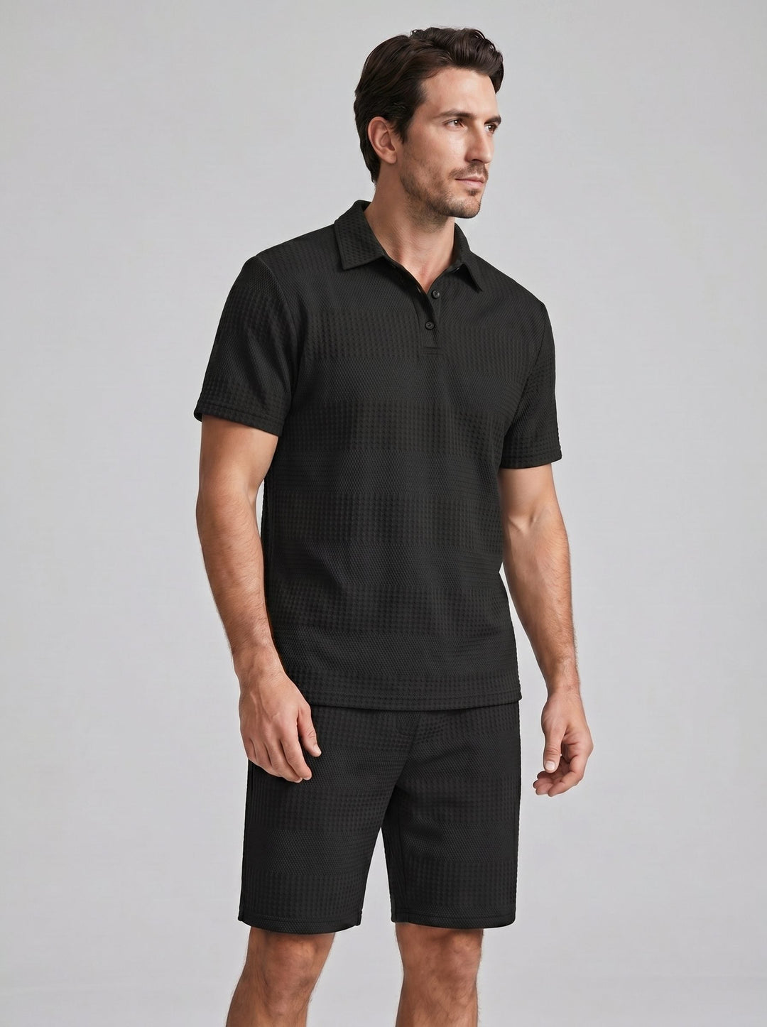 Loungewear redefined: Men's textured polo shirt and shorts set for relaxation.