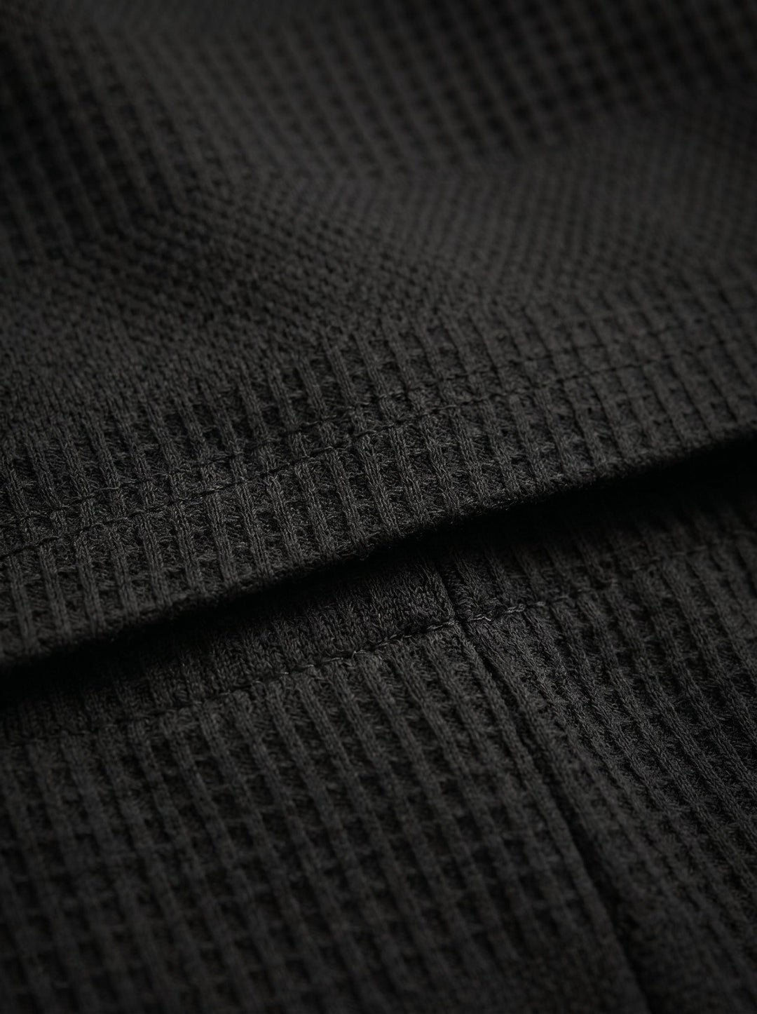 Men's two-piece textured summer set. Polo shirt and shorts for ultimate comfort.