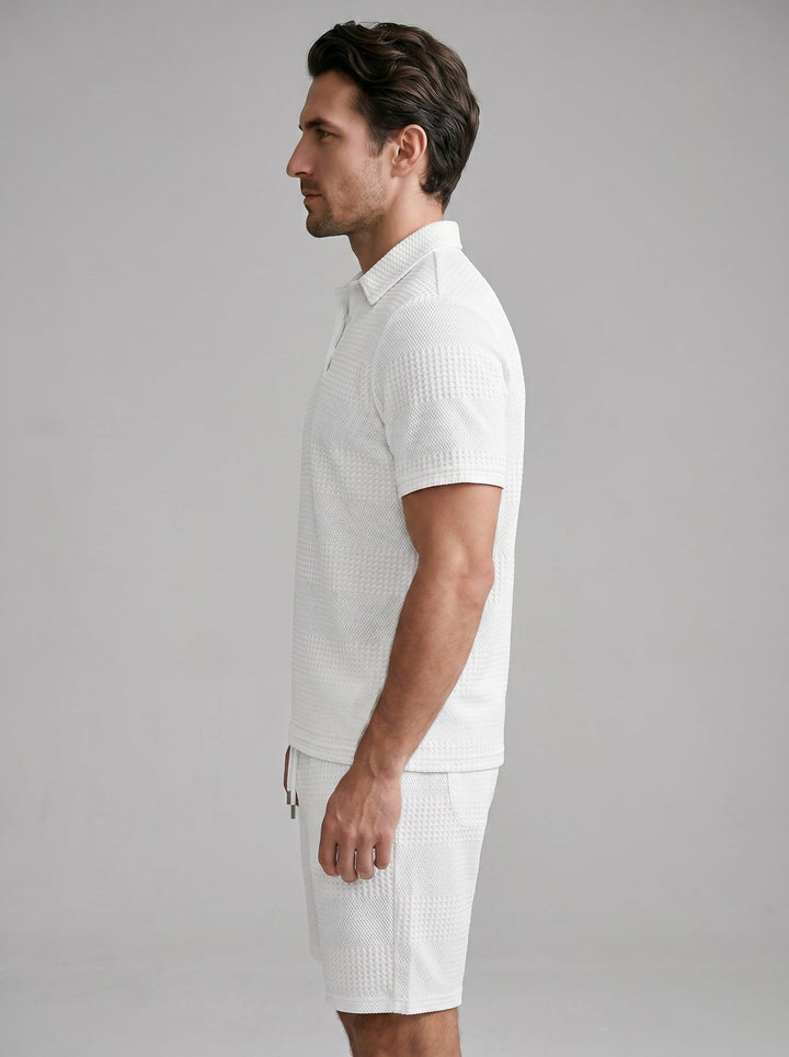 Stylish men's coordinated textured polo shirt and shorts set. Casual summer outfit.