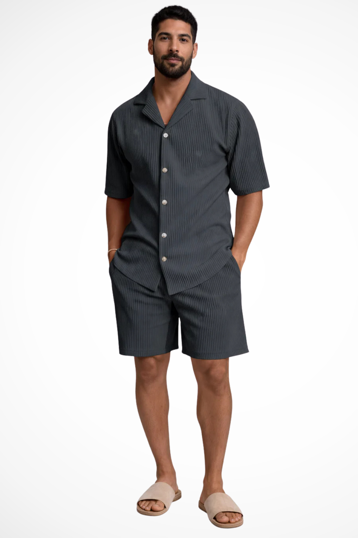 Trendy men's co-ord set: textured button-up short sleeve shirt paired with matching summer shorts.