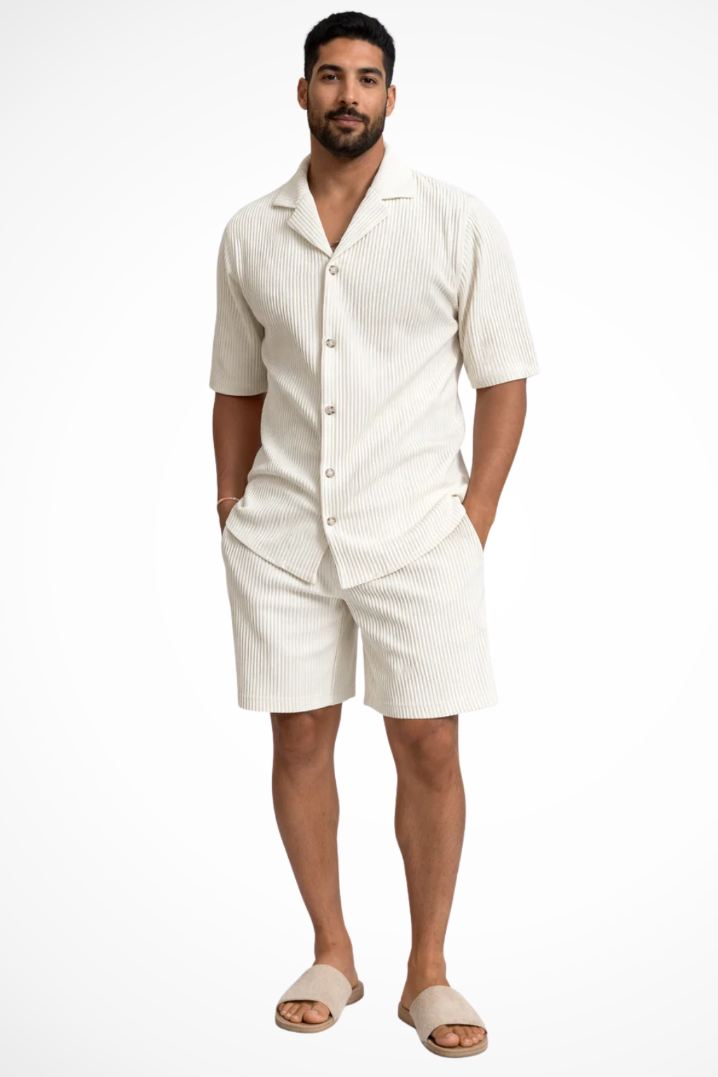 Complete men's summer fashion outfit: a textured short sleeve shirt with coordinating casual shorts.