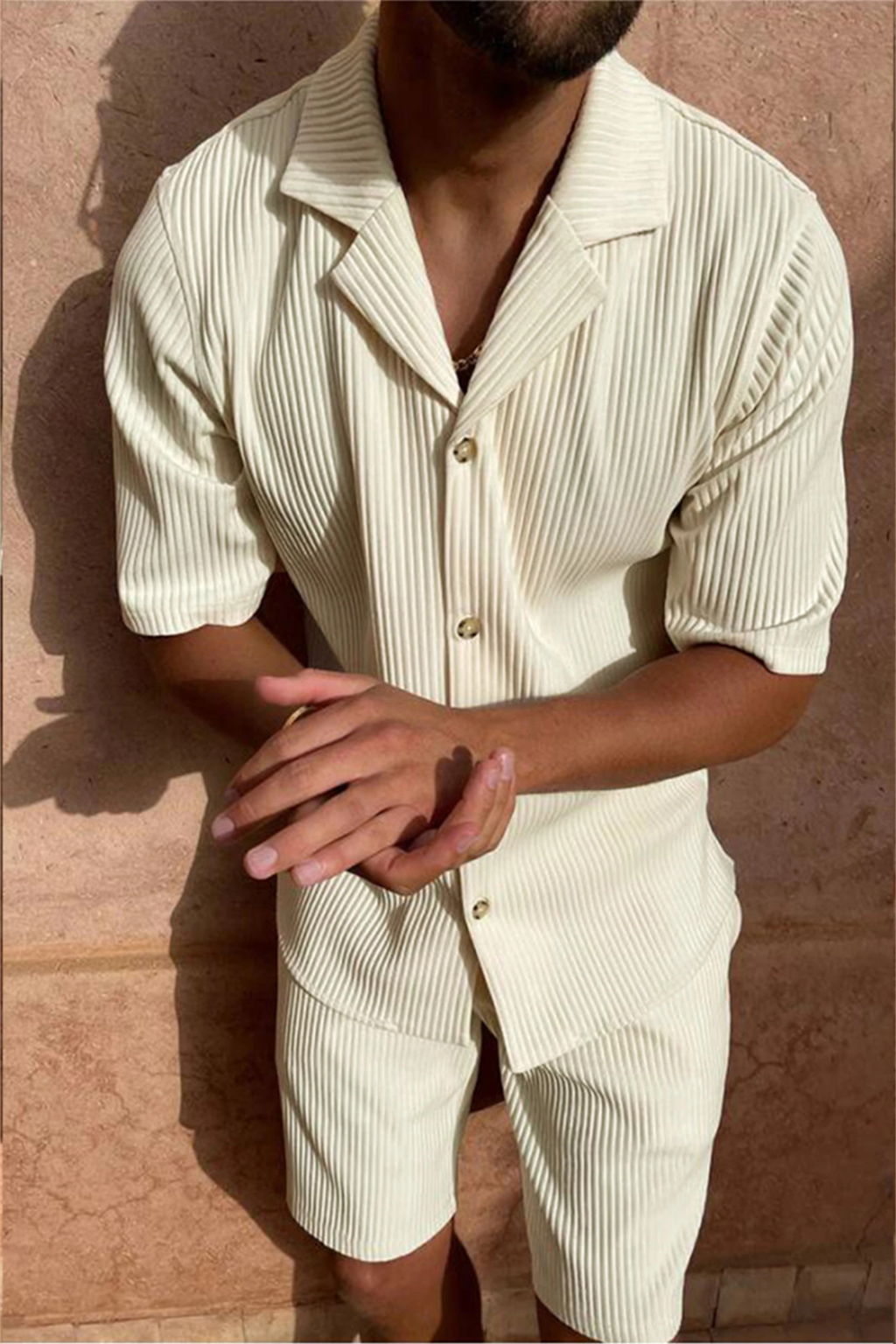 Men's comfortable textured summer outfit, featuring a short sleeve shirt and easy-wear matching shorts.