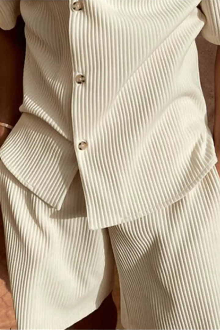 Modern men's textured two-piece summer casual wear set, ideal for relaxed style or holidays.