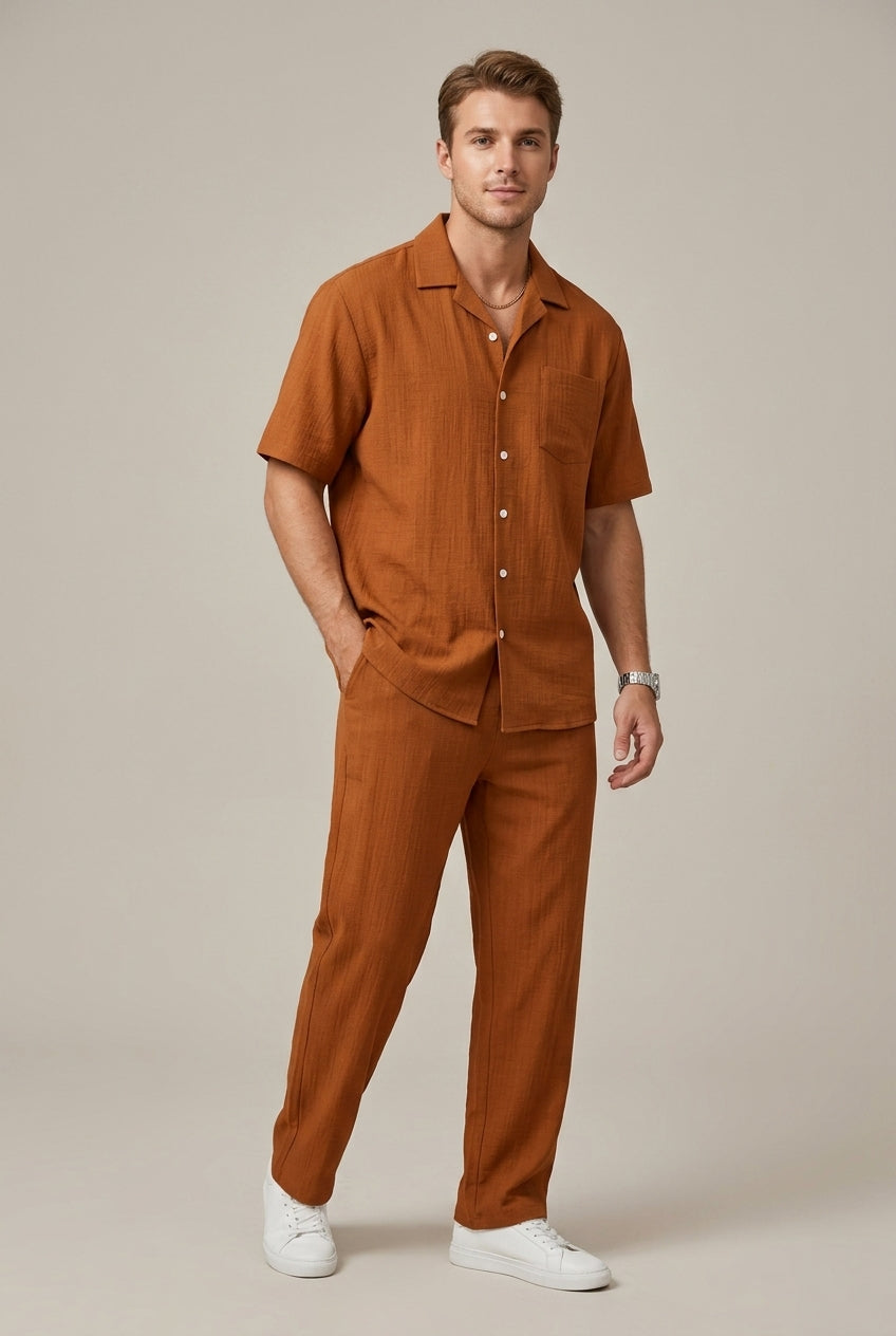 Versatile men's smart casual outfit: textured short sleeve shirt & comfortable drawstring trousers. Effortless style set.