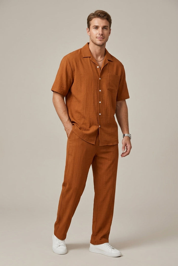 Versatile men's smart casual outfit: textured short sleeve shirt & comfortable drawstring trousers. Effortless style set.