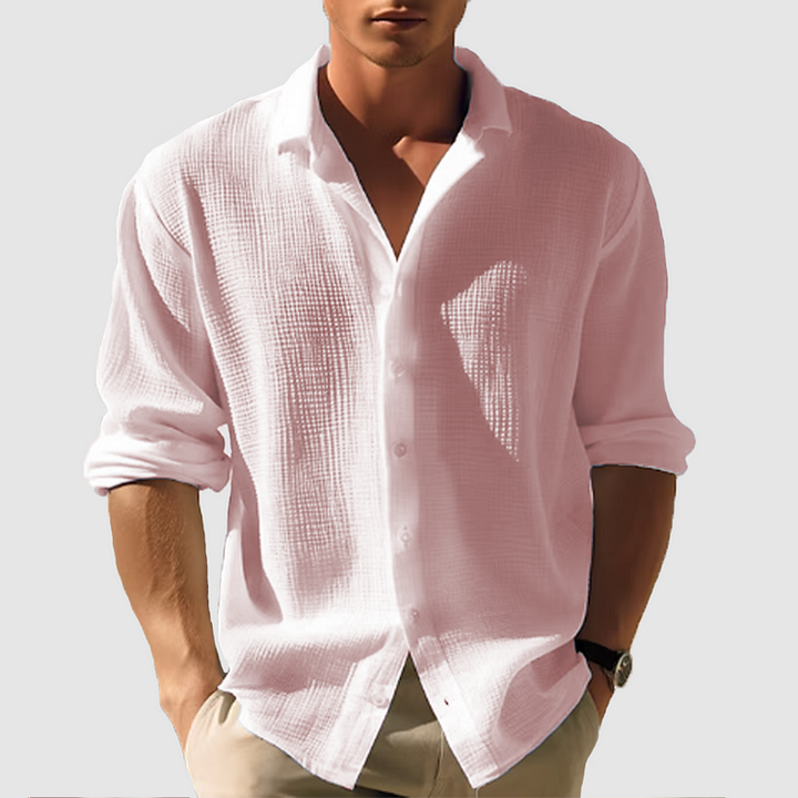 Relaxed fit men's long sleeve button-down shirt in a versatile textured weave, perfect for comfortable smart casual looks.