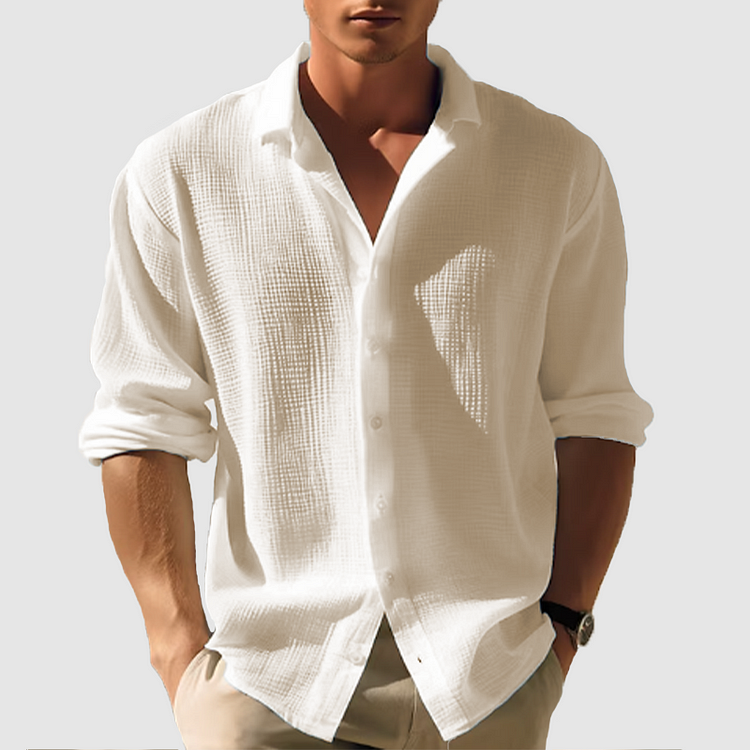 Men's smart casual button-down shirt, styled open to show versatility. Features long sleeves, spread collar & textured weave.