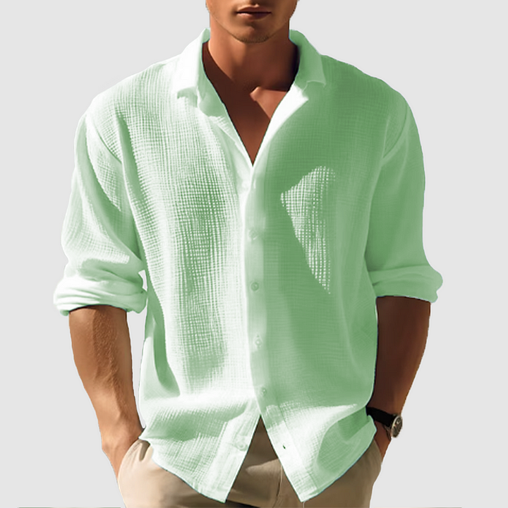 Classic men's long sleeve button-down shirt with a comfortable relaxed fit, smart spread collar, and unique textured weave.