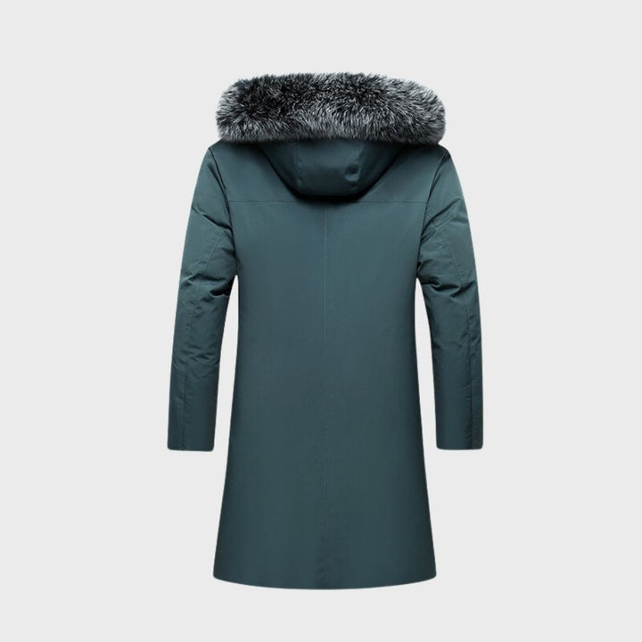 Man hiking in a men's waterproof & windproof winter jacket, ideal for cold weather outdoor sports.