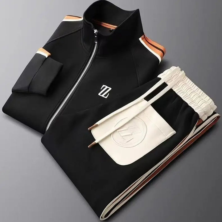 Grey men's urban tracksuit featuring a full zip athletic jacket and comfortable joggers.