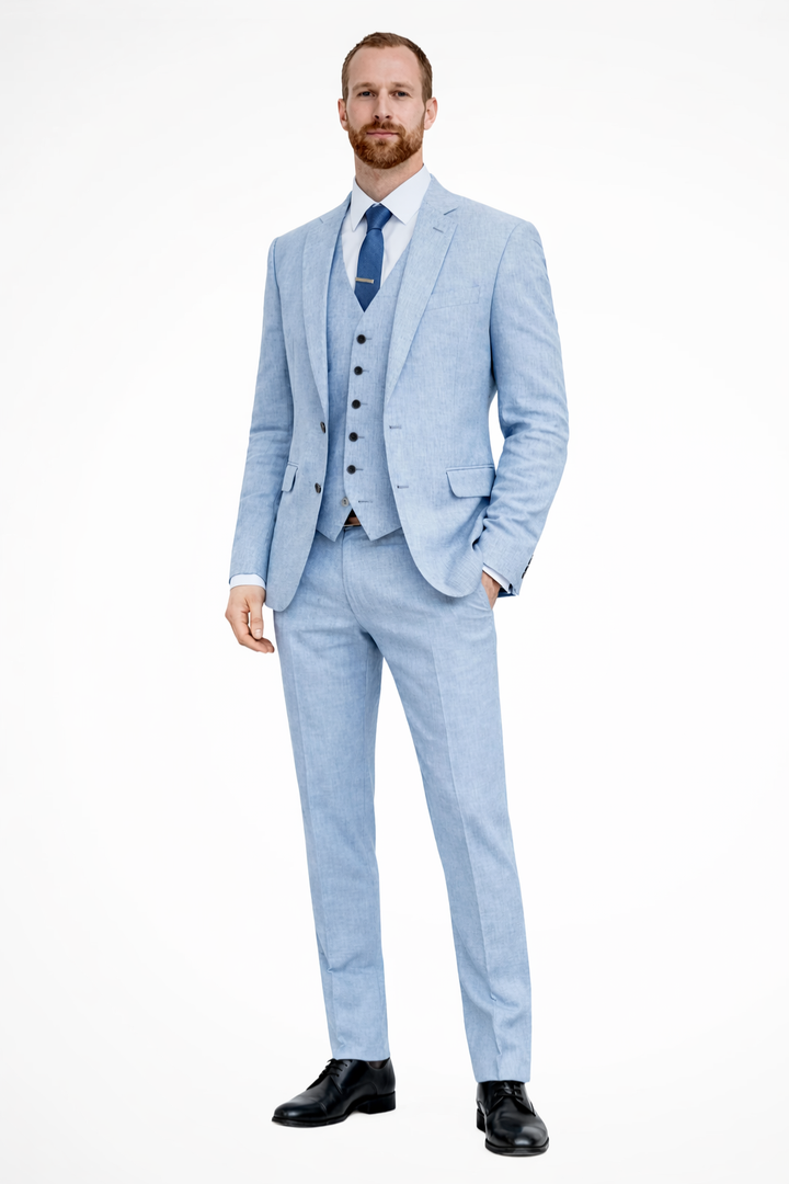 Elegant three-piece men's suit in navy, perfect for wedding guest attire.