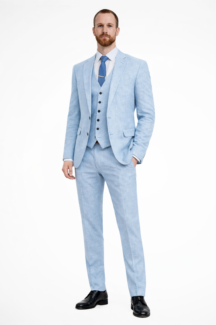 Tailored fit navy trousers, part of a men's wedding guest suit ensemble.