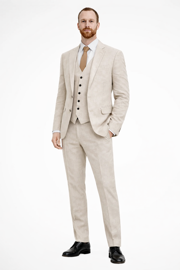 Stylish navy men's three-piece suit ensemble for formal event dressing.