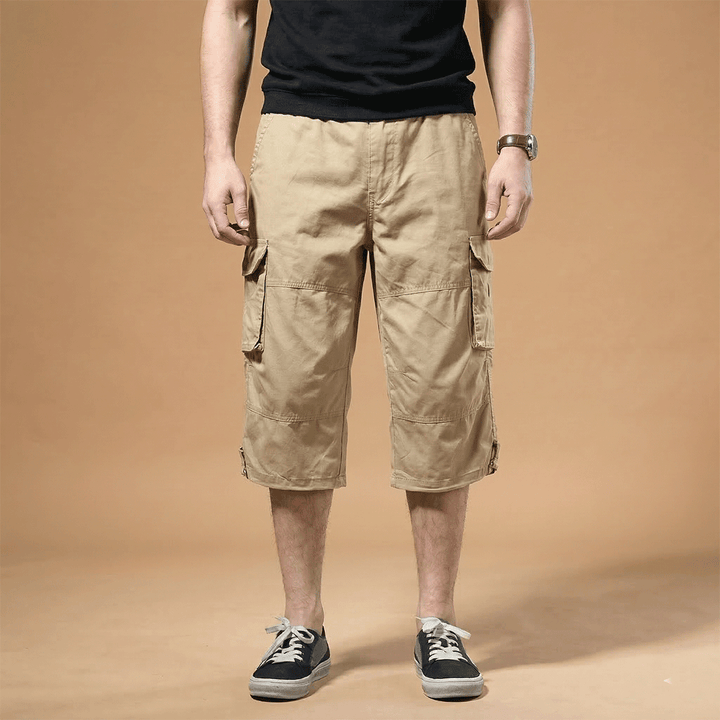 Summer pants for men, designed with a three-quarter cut and functional pockets.
