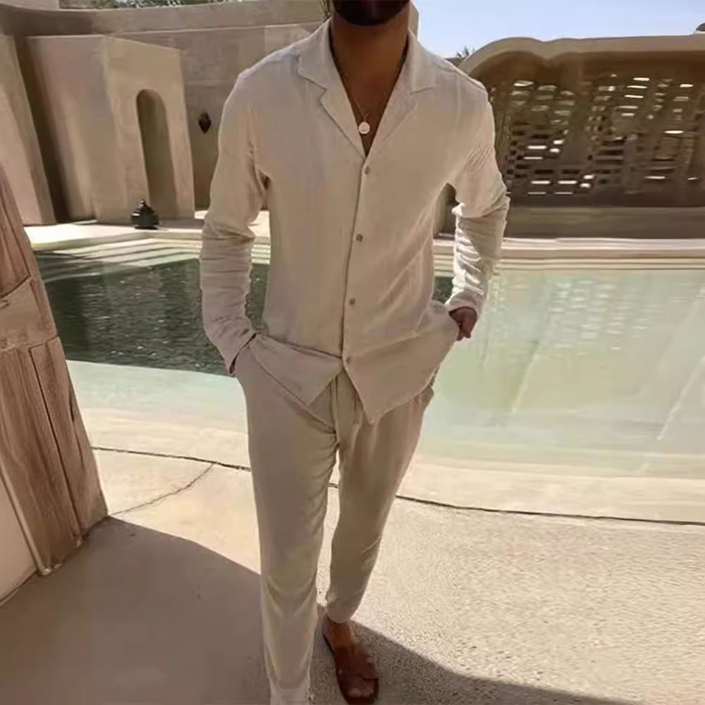 Men's timeless long sleeve top & fitted trousers set for casual wear. Comfortable two-piece outfit.