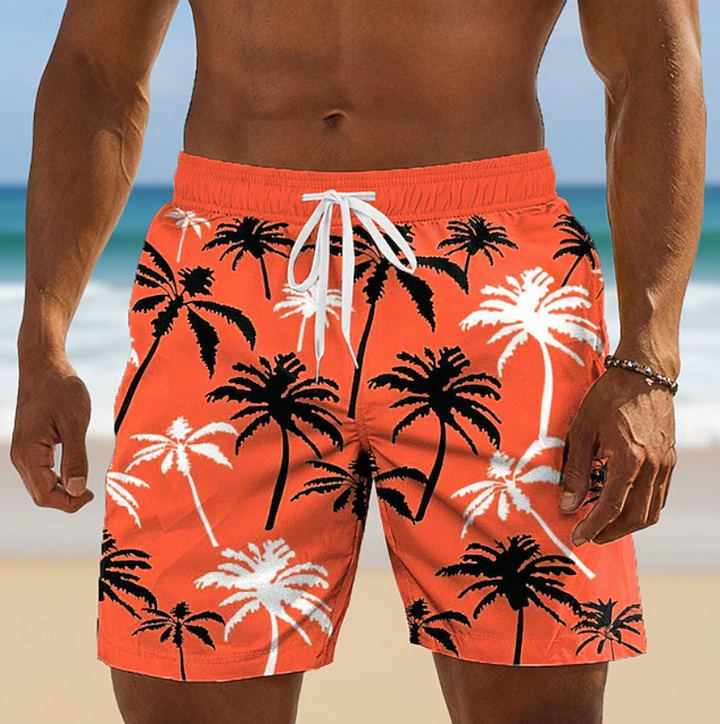 Casual men's summer shorts with a vibrant tropical print & comfy drawstring waist. Ideal for vacation.