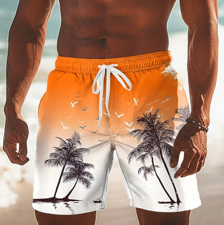 Relaxed fit men's tropical shorts for warm weather. Stylish drawstring & comfortable beachwear.